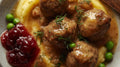 Classic Swedish Meatballs, Beef and Pork, Creamy Dill Sauce, Pommes Puree, Lingonberry Jam, Peas 